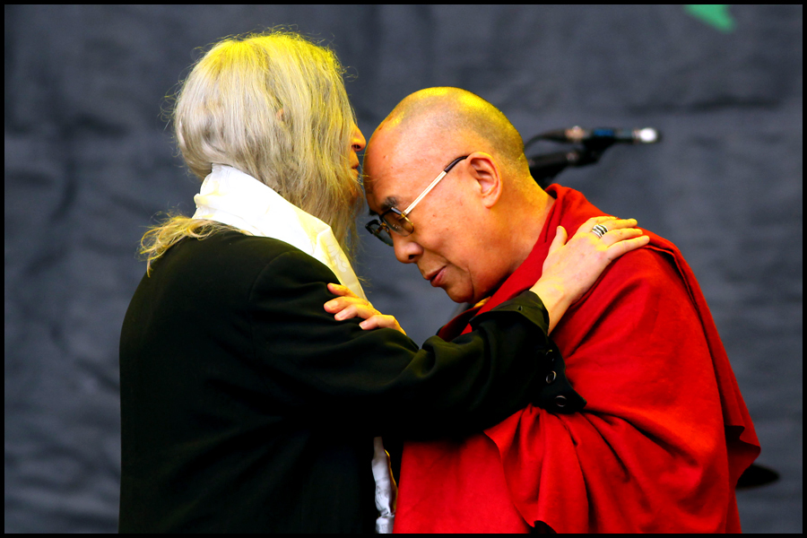 Patti Smith introduces the Dalia Lama onto the Pyramid Stage ahead of his 80th birthday at the 2015 Glastonbury Festival.
