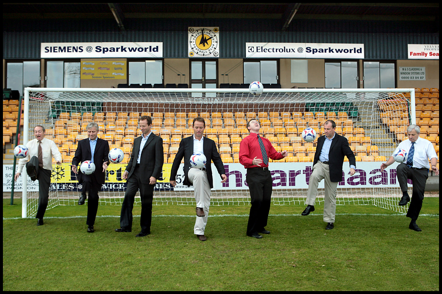 Directors for Torquay Utd practice their ball skills along with new director Chris Boyce (Boyce Hatton Solicitors- Centre). CLIENT: Boyce Hatton Solicitors