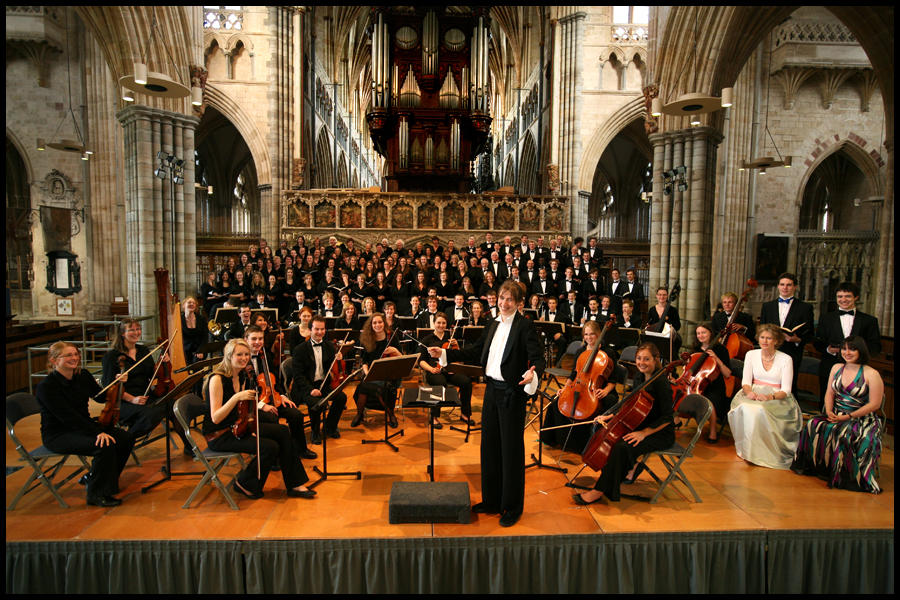Group shot of the Exeter University orchestra practicing at Exeter Cathedral. CLIENT: Exeter University.
